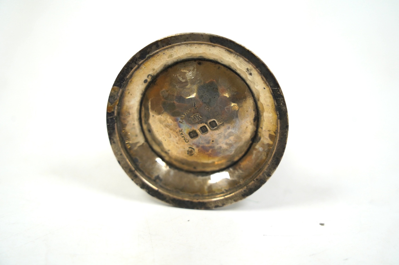 A George VI Arts & Crafts planished silver salt condiment by Omar Ramsden, London, 1837, 65mm. Condition - fair